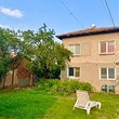 Two houses sharing a yard for sale in a village near Pernik